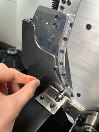 Drop door cover side screws