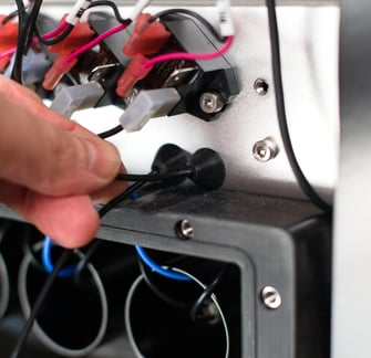 Pull grommet into place